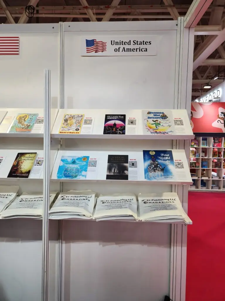 Collection of books and magazines showcased on a wall.