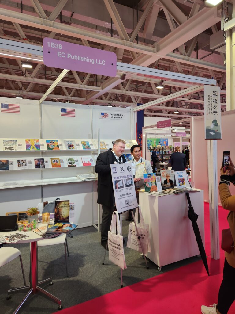 Collection of books and magazines showcased on a wall.