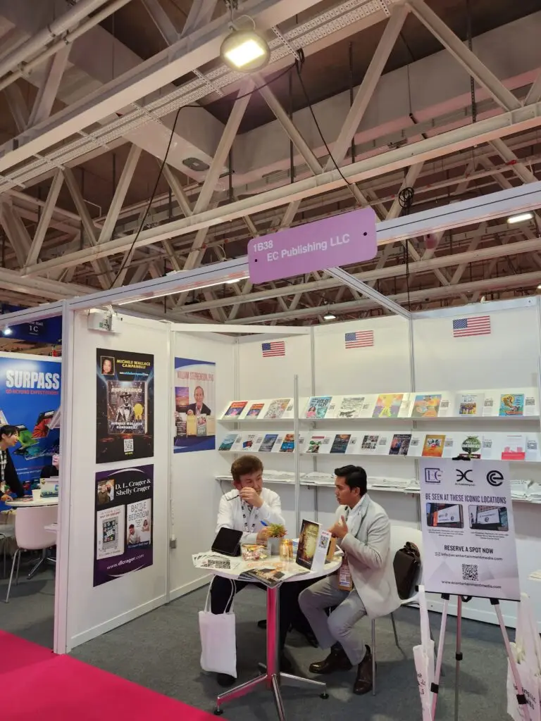 Collection of books and magazines showcased on a wall.